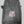A black zippered hockey bag with a Minnesota Wild logo patch on the front, photographed on a gray textured surface.